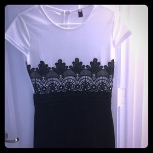 Embroidery dress in black and beige.